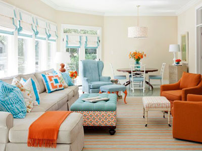 оранжевый цвет в дизайне гостиной